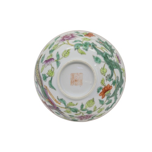130 - A FAMILLE ROSE 'DRAGON AND PHOENIX' BOWLXIANFENG SEAL MARK AND OF THE PERIOD14cm diameter; together ... 