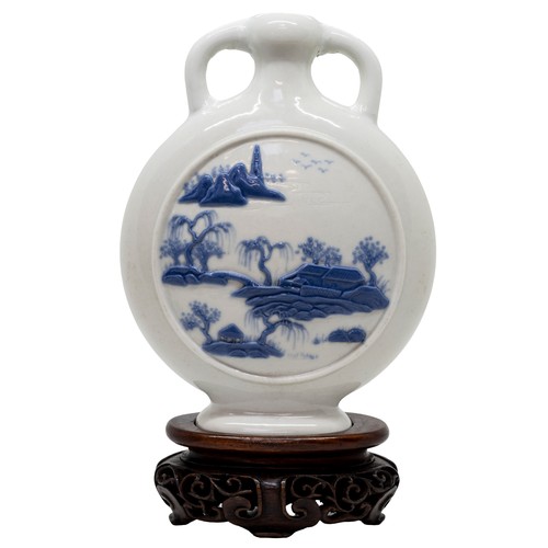 46 - A SMALL CHINESE BLUE AND WHITE RELIEF MOULDED MOON FLASKDAOGUANG SEAL MARK, 20TH CENTURYwith a foitt... 