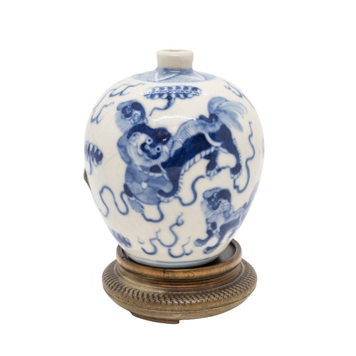 55 - A SMALL SOFT-PASTE BLUE AND WHITE 'BUDDHIST-LION' JARLETKANGXI SIX CHARACTER MARK, LATE QING DYNASTY... 