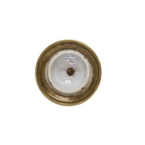 57 - A CHINESE BLUE AND WHITE CANDLESTICKKANGXI PERIODwith gilt-metal mounts 19cm highPROVENANCE: From th... 
