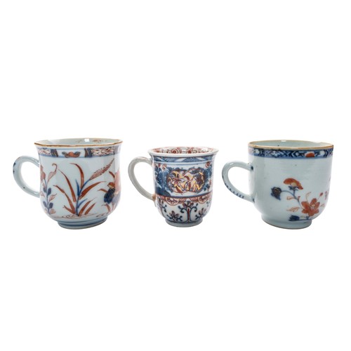 147 - A GROUP OF NINE CHINESE EXPORT UNDERGLAZE BLUE AND IRON RED TEACUPSQING DYNASTY, 18TH CENTURY Variou... 