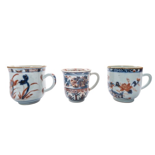 147 - A GROUP OF NINE CHINESE EXPORT UNDERGLAZE BLUE AND IRON RED TEACUPSQING DYNASTY, 18TH CENTURY Variou... 