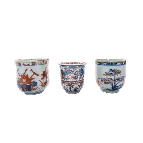 147 - A GROUP OF NINE CHINESE EXPORT UNDERGLAZE BLUE AND IRON RED TEACUPSQING DYNASTY, 18TH CENTURY Variou... 