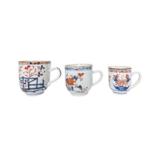 147 - A GROUP OF NINE CHINESE EXPORT UNDERGLAZE BLUE AND IRON RED TEACUPSQING DYNASTY, 18TH CENTURY Variou... 