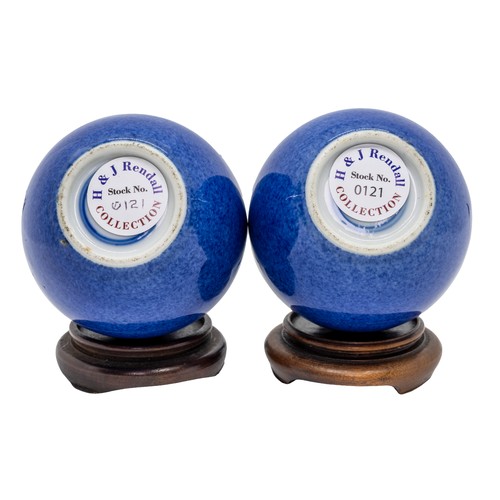 28 - A PAIR OF MINIATURE POWDER-BLUE BOTTLE VASESQING DYNASTY, 18TH / 19TH CENTURYwith wood stands12cm hi... 