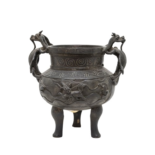 7 - A BRONZE 'MYTHICAL-BEAST' TRIPOD CENSERXUANDE SIX CHARACTER MARK, QING DYNASTY, 19TH CENTURY18cm hig... 