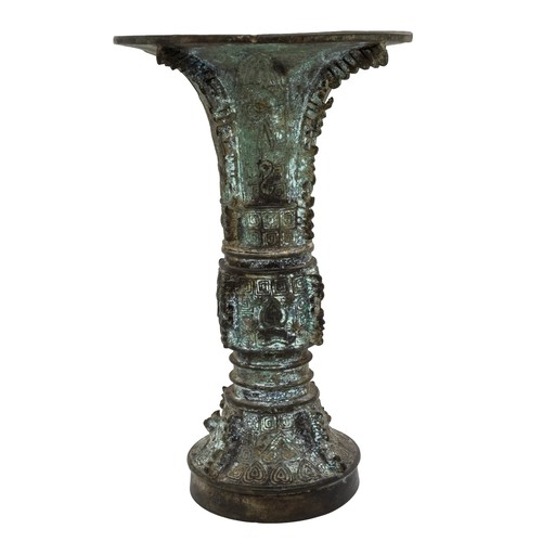 9 - AN ARCHAISTIC BRONZE GU-FORM VASEQING DYNASTY18cm highPROVENANCE: From the H & J Rendall Collect... 