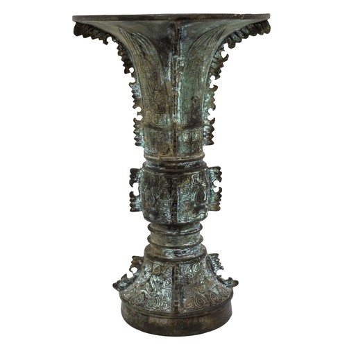 9 - AN ARCHAISTIC BRONZE GU-FORM VASEQING DYNASTY18cm highPROVENANCE: From the H & J Rendall Collect... 