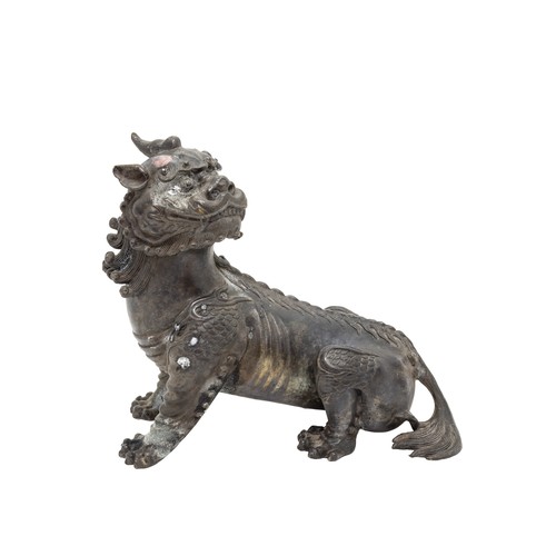 10 - A BRONZE FIGURE A QILINLATE QING DYNASTY16cm wide; together with A BRONZE FIGURE OF A SAGE RIDING A ... 