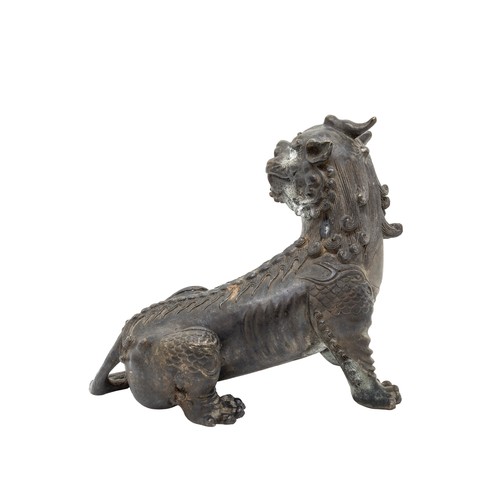 10 - A BRONZE FIGURE A QILINLATE QING DYNASTY16cm wide; together with A BRONZE FIGURE OF A SAGE RIDING A ... 