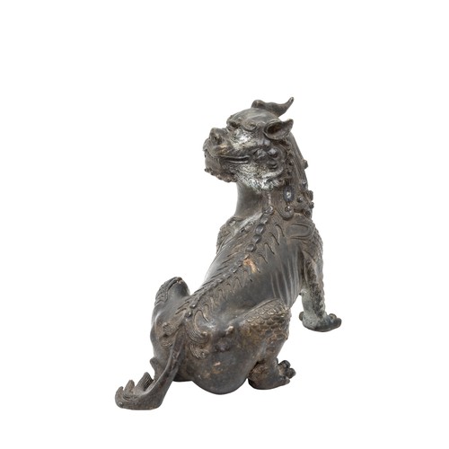 10 - A BRONZE FIGURE A QILINLATE QING DYNASTY16cm wide; together with A BRONZE FIGURE OF A SAGE RIDING A ... 