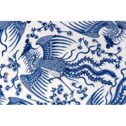 120 - A LARGE BLUE AND WHITE 'PHOENIX' CHARGERKANGXI SIX-CHARACTER MARK AND OF THE PERIOD清康熙 青花凤穿牡丹大盘finel... 