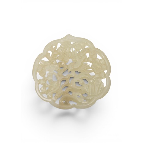 17 - A FINE CHINESE WHITE JADE OPENWORK RUYI-FORM PEDANT18TH/19TH CENTURY清 十八/十九世纪 白玉镂空雕花挂坠carved with a ... 