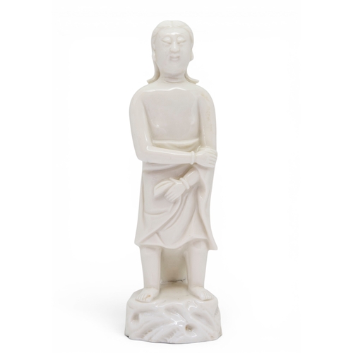 33 - A RARE CHINESE BLANC DE CHINE STANDING FIGURE OF ADAMEARLY KANGXI, CIRCA 1680, DEHUA KILNS, FUJIAN P... 