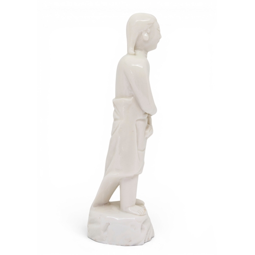 33 - A RARE CHINESE BLANC DE CHINE STANDING FIGURE OF ADAMEARLY KANGXI, CIRCA 1680, DEHUA KILNS, FUJIAN P... 