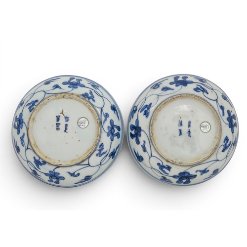 46 - AN UNUSUAL PAIR OF CHINESE PORCELAIN BLUE AND WHITE SAUCER DISHES,16TH CENTURY, 1570-1600明 万历/天启 青花瑞... 
