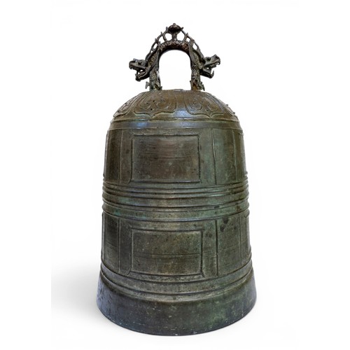 25 - A CHINESE LARGE AND IMPRESSIVE BRONZE BELL WITH DOUBLE-DRAGON HANDLEWANLI, 1601明 万历二十九年青铜钟 with an i... 