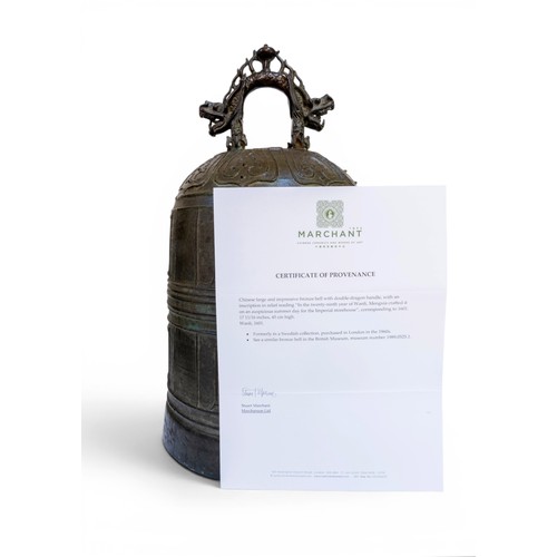 25 - A CHINESE LARGE AND IMPRESSIVE BRONZE BELL WITH DOUBLE-DRAGON HANDLEWANLI, 1601明 万历二十九年青铜钟 with an i... 