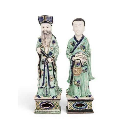 6 - A RARE PAIR OF CHINESE FAMILLE VERTE BISCUIT PORCELAIN FIGURES OF THE STANDING IMMORTALS LAN CAIHE H... 
