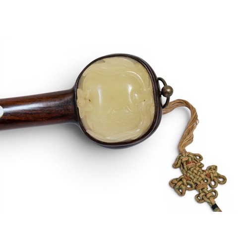 1 - A RARE CHINESE WOODEN RUYI SCEPTRE18TH-19TH CENTURY清 十八/十九世纪  红木嵌白玉如意inset with three jade plaques o... 