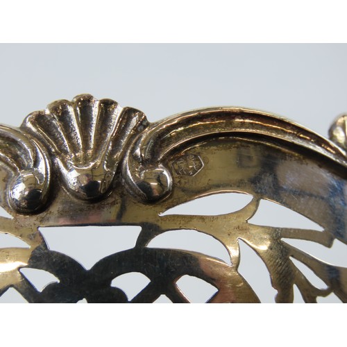 44 - A DUTCH SILVER SWEETMEAT BASKETwith scrolling ring handles and pierced lattice sides, raised on four... 