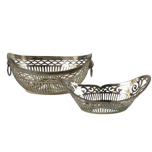 16 - TWO DUTCH SILVER SWEETMEAT BASKETSboth of oval form with pierced lattice sides, the larger with lion... 