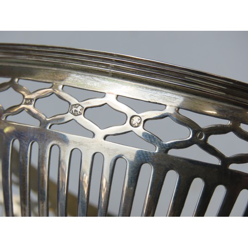 16 - TWO DUTCH SILVER SWEETMEAT BASKETSboth of oval form with pierced lattice sides, the larger with lion... 