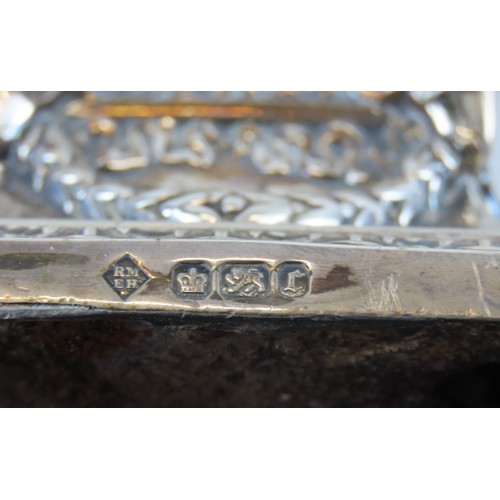 42 - A PAIR OF LATE VICTORIAN FILLED SILVER CANDLESTICKSSHEFFIELD 1895Corinthian form pillars on square b... 