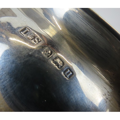 17 - A GEORGE V SILVER SUGAR BOWL BIRMINGHAM compressed form with twin scrolling handles6 cm high x 6.5 c... 