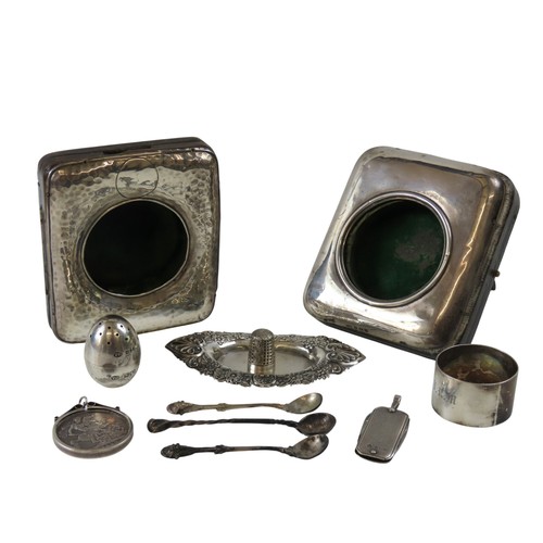 52 - TWO SILVER FRONTED WATCH STANDS one Edwardian example with planished finish, together with other sil... 