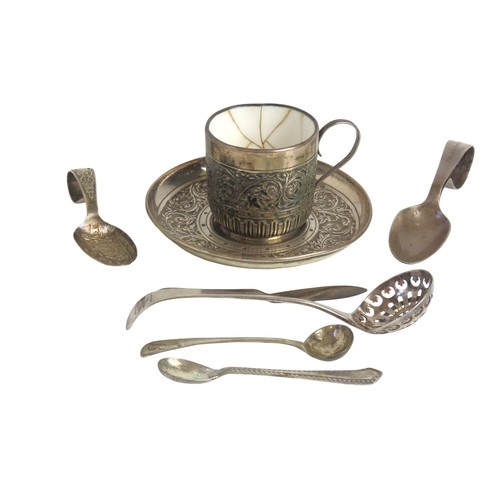 18 - A LATE VICTORIAN SILVER COVERED CUP AND SAUCERLONDON 1887the porcelain lined cup and saucer with rep... 
