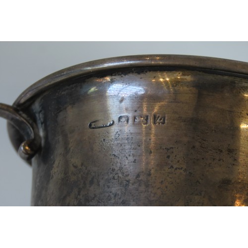 54 - A GEORGE V SILVER PORRINGERBIRMINGHAM 1924with twin 'S'-scroll handles(6.8 cm high x 9.2 cm diam, 11... 