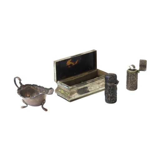 37 - A MIXED GROUP OF SILVER WAREthe lot includes a silver and tortoise shell ring box, a small sauceboat... 