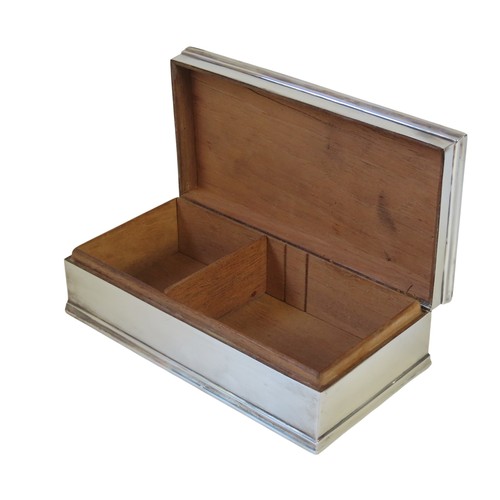 39 - A VINTAGE SILVER COVERED CIGAR BOXBIRMINGHAM 1921rectangular form with engine turned cover632 grams ... 