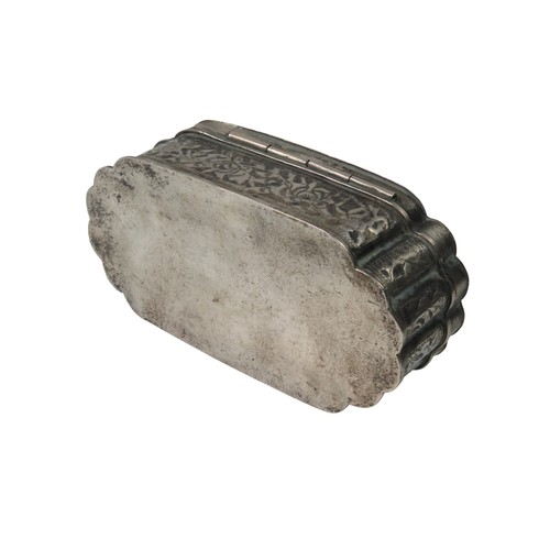 41 - AN INDIAN SILVER CARTOUCHE FORM BOXwith chased scroll foliate decoration3.5 x 12.2 x 5.8 cm72 grams... 