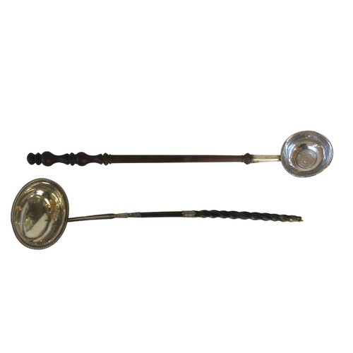 13 - TWO SILVER TODDY LADLES, one with a baleen handle and beaded edge oval bowl, the other with a turned... 