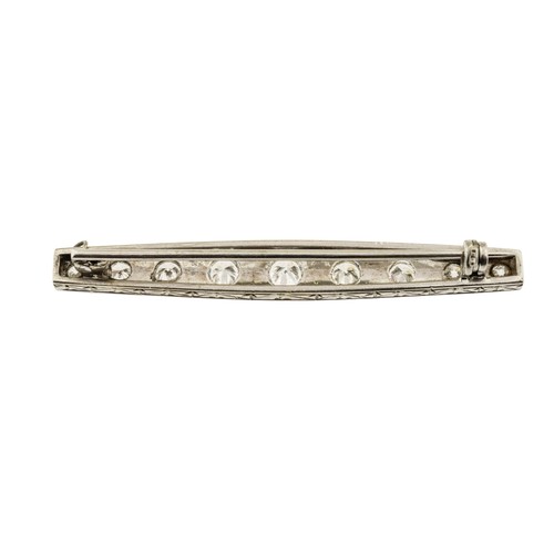 213 - A DIAMOND BROOCH, set with nine graduating brilliant cut diamonds, approximately 1.50 carats total, ... 