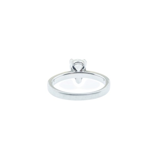 223 - A PLATINUM DIAMOND RING, the pear cut diamond, estimated to weigh 1.00 carat, in a three claw settin... 