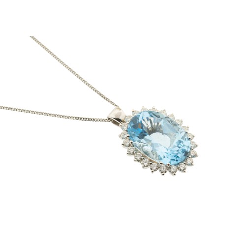 220 - AN 18 CARAT GOLD AQUAMARINE AND DIAMOND PENDANT,the oval cut aquamarine claw set within a surround o... 