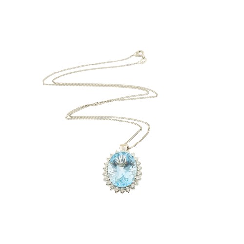 220 - AN 18 CARAT GOLD AQUAMARINE AND DIAMOND PENDANT,the oval cut aquamarine claw set within a surround o... 