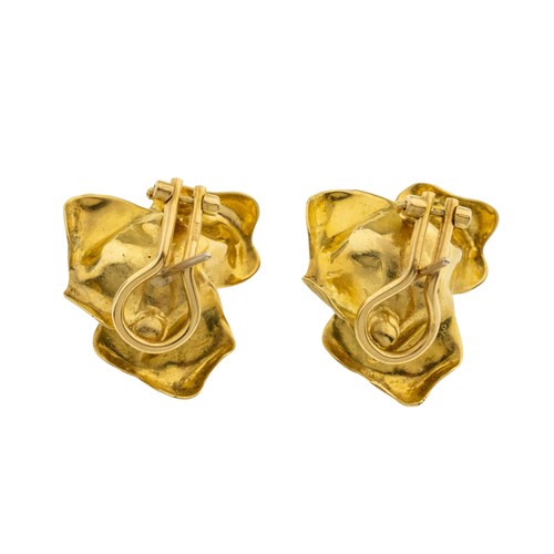 232 - A PAIR OF 18 CARAT GOLD RUBY EARRINGS, 1960s,the flower heads set with a central cluster of circular... 