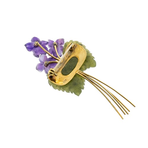 239 - A 14 CARAT GOLD AMETHYST, NEPHRITE AND DIAMOND BROOCH, 1960sretailed by Asprey & Co. Ltd., the t... 