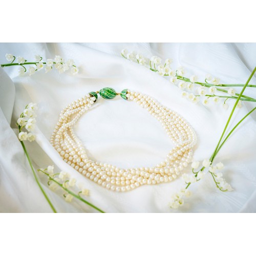 222 - A CULTURED PEARL AND ENAMEL NECKLACE,the five rows of uniform 4mm cultured pearls, to a green enamel... 