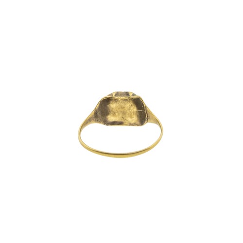 244 - AN ISLAMIC SELJUK INTAGLIO GARNET TALISMAN RING, 13th century, the oval garnet carved with a bird, w... 