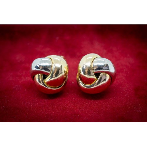 229 - A PAIR OF 18 CARAT GOLD TRINITY KNOT EARRINGS BY CARTIER, designed as tri coloured polished knots. W... 