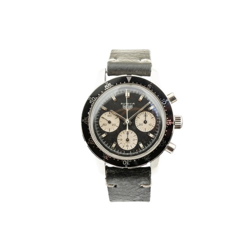 256 - HEUER: A STEEL AUTAVIA CHRONOGRAPH WRISTWATCH; Ref 2446, Serial No. 110075, reverse panda dial, sign... 