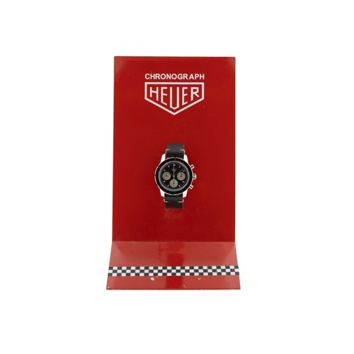 256 - HEUER: A STEEL AUTAVIA CHRONOGRAPH WRISTWATCH; Ref 2446, Serial No. 110075, reverse panda dial, sign... 