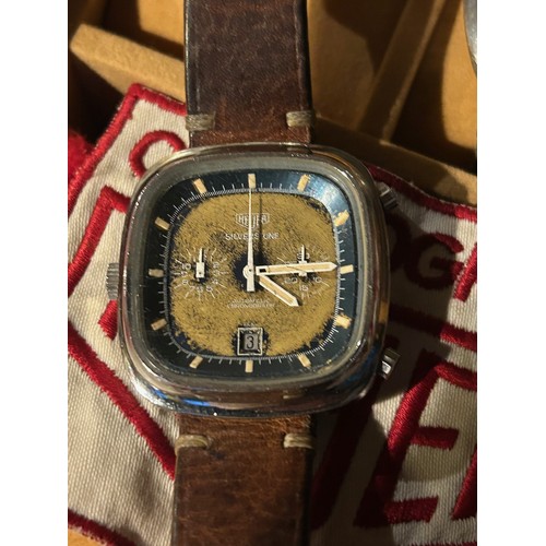 255 - HEUER: A STEEL SILVERSTONE CHRONOGRAPH WRSTWATCH, the faded dial signed Heuer Silverstone Automatic ... 