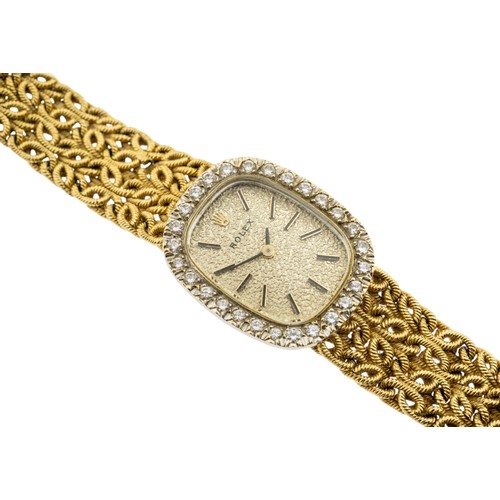 247 - ROLEX: AN 18K GOLD AND DIAMOND LADIES WRISTWATCHbark finish silvered dial signed Rolex, baton numera... 