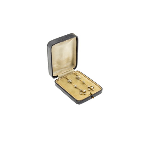207 - A PAIR OF LATE VICTORIAN PEARL AND DIAMOND EARRINGS, CIRCA 1900,the 4mm pearls suspended within a ci... 